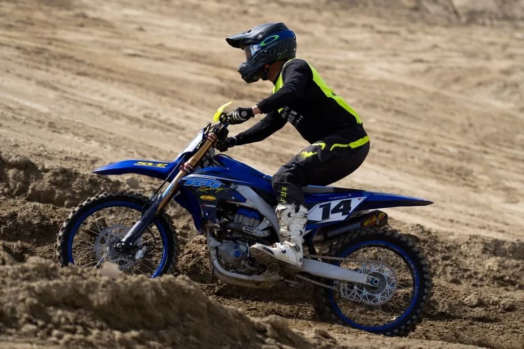 Travis Flateau racing his number 14 Yamaha through a corner.